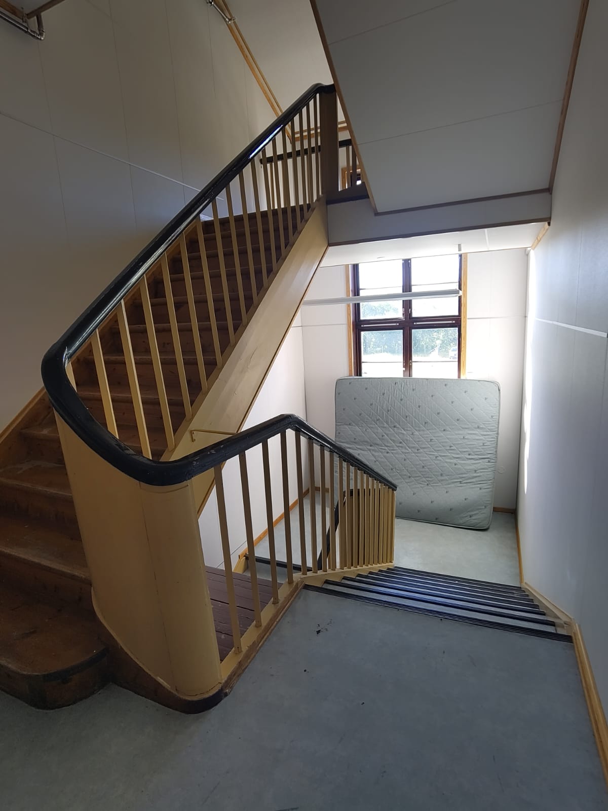 Stairway in the old school, with a mattress